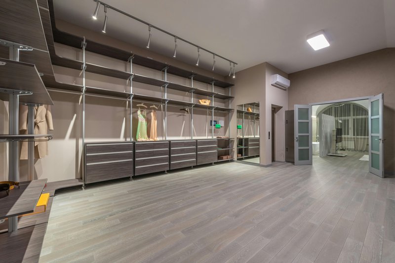his and hers walk in closet sharing space seamlessly — practical organization ideas