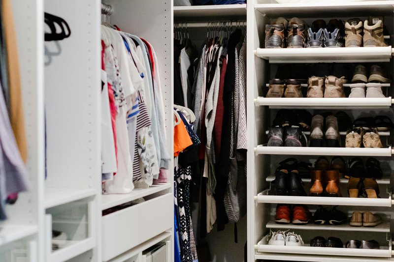 his and hers walk in closet sharing space seamlessly — practical organization ideas