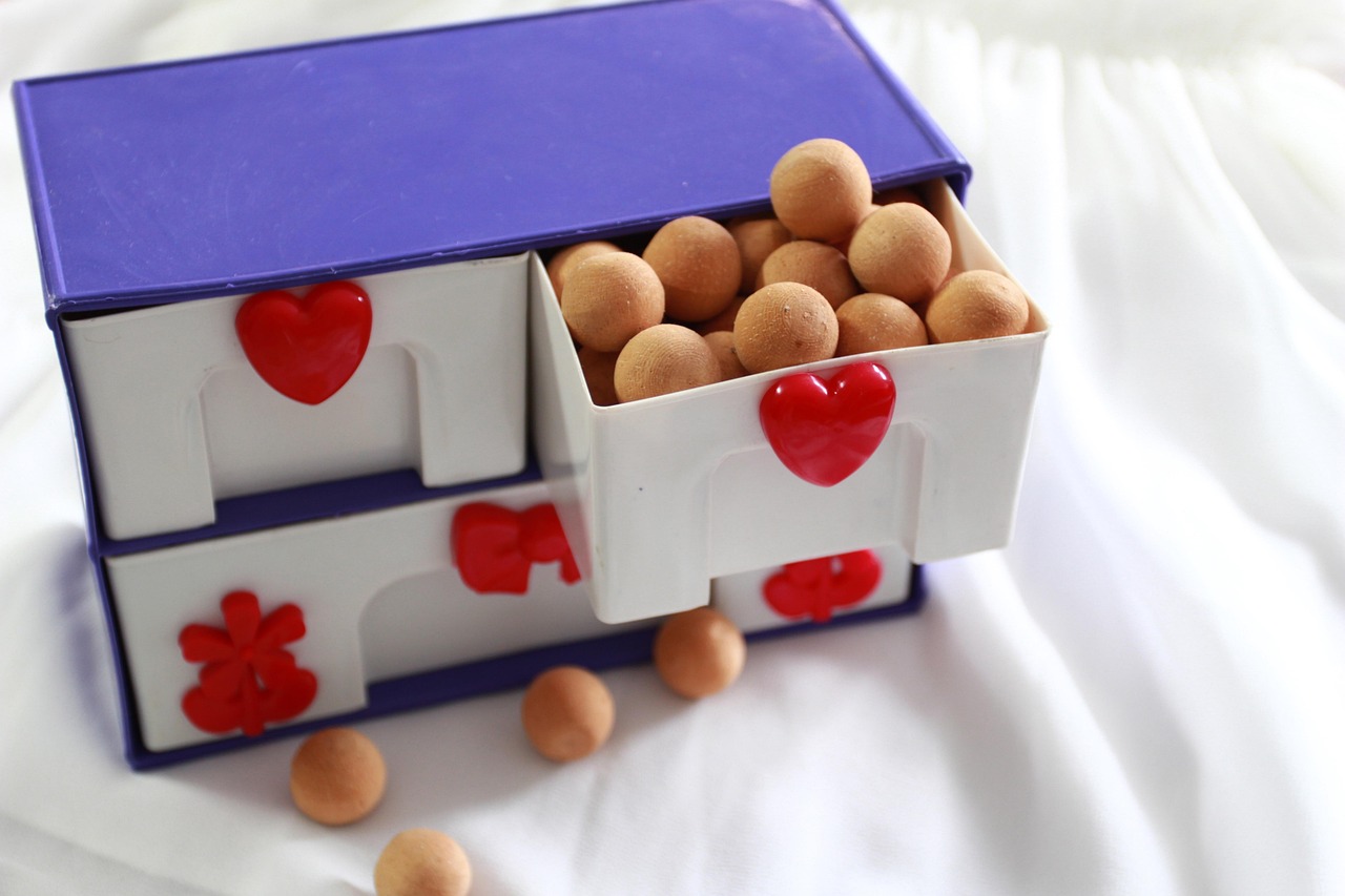 box, wooden ball, drawer, cabinet, cupboard, plastic locker, closet, shelf